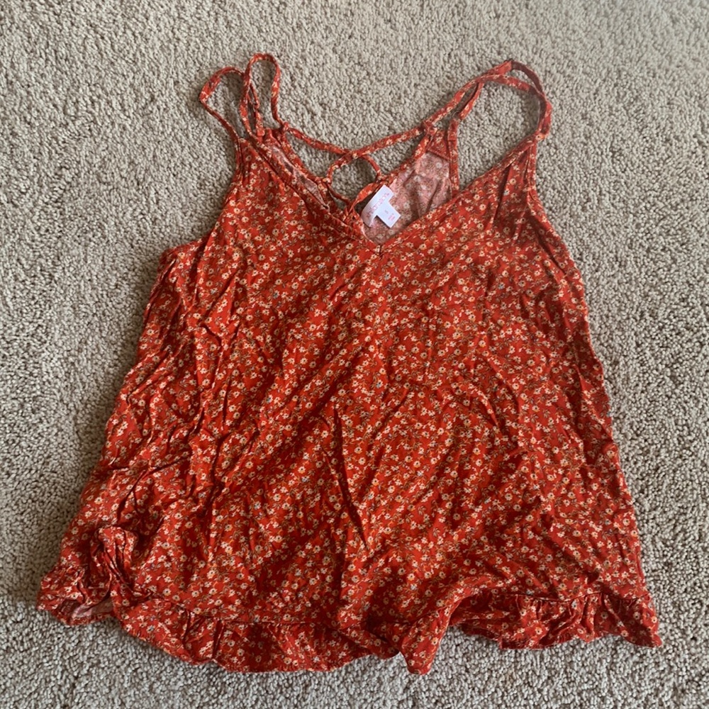 Orange flower cropped tank top with tied back and adjustable straps